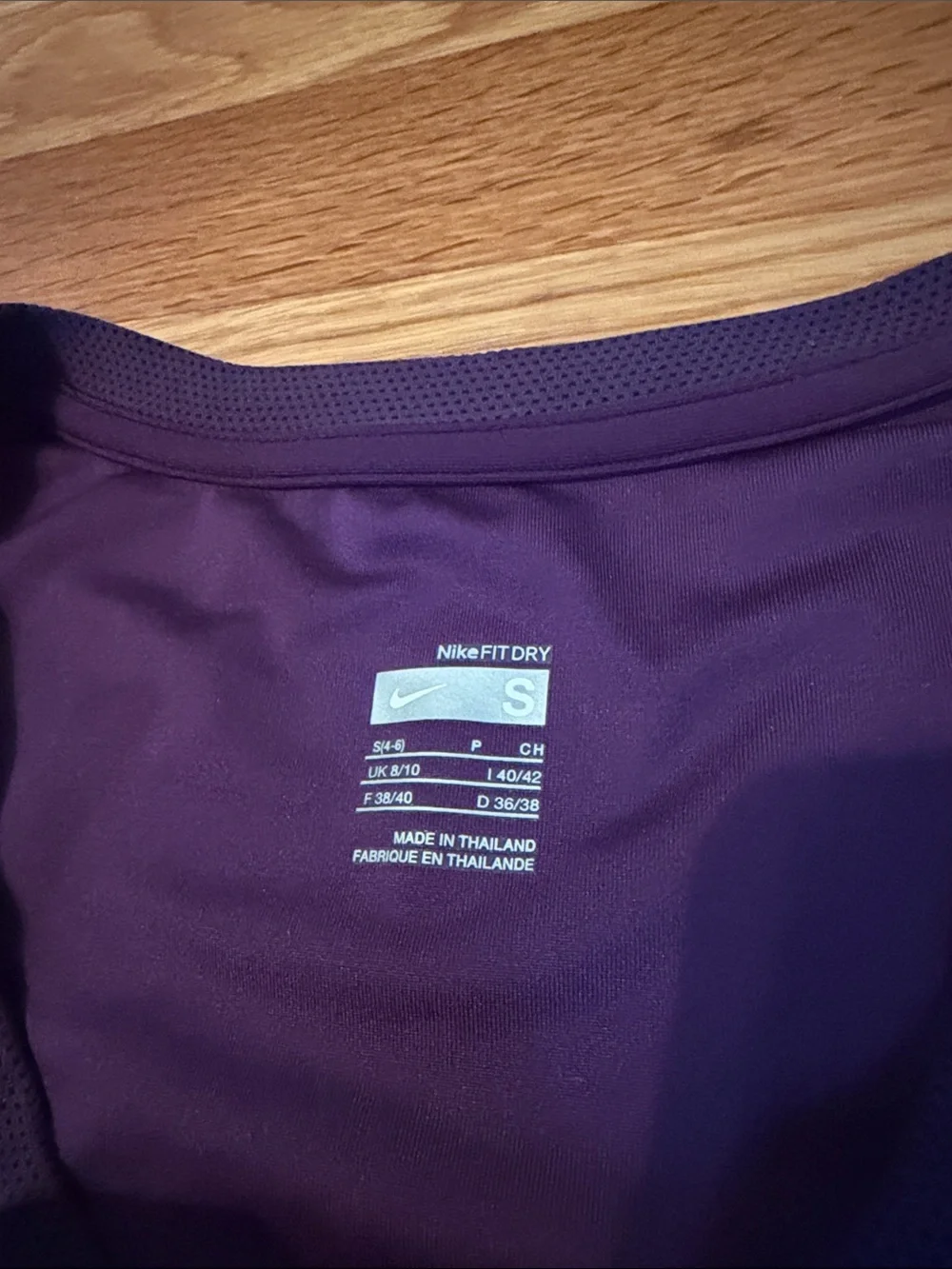 Nike Women’s Purple Athletic V-Neck Tank with Pink Swoosh